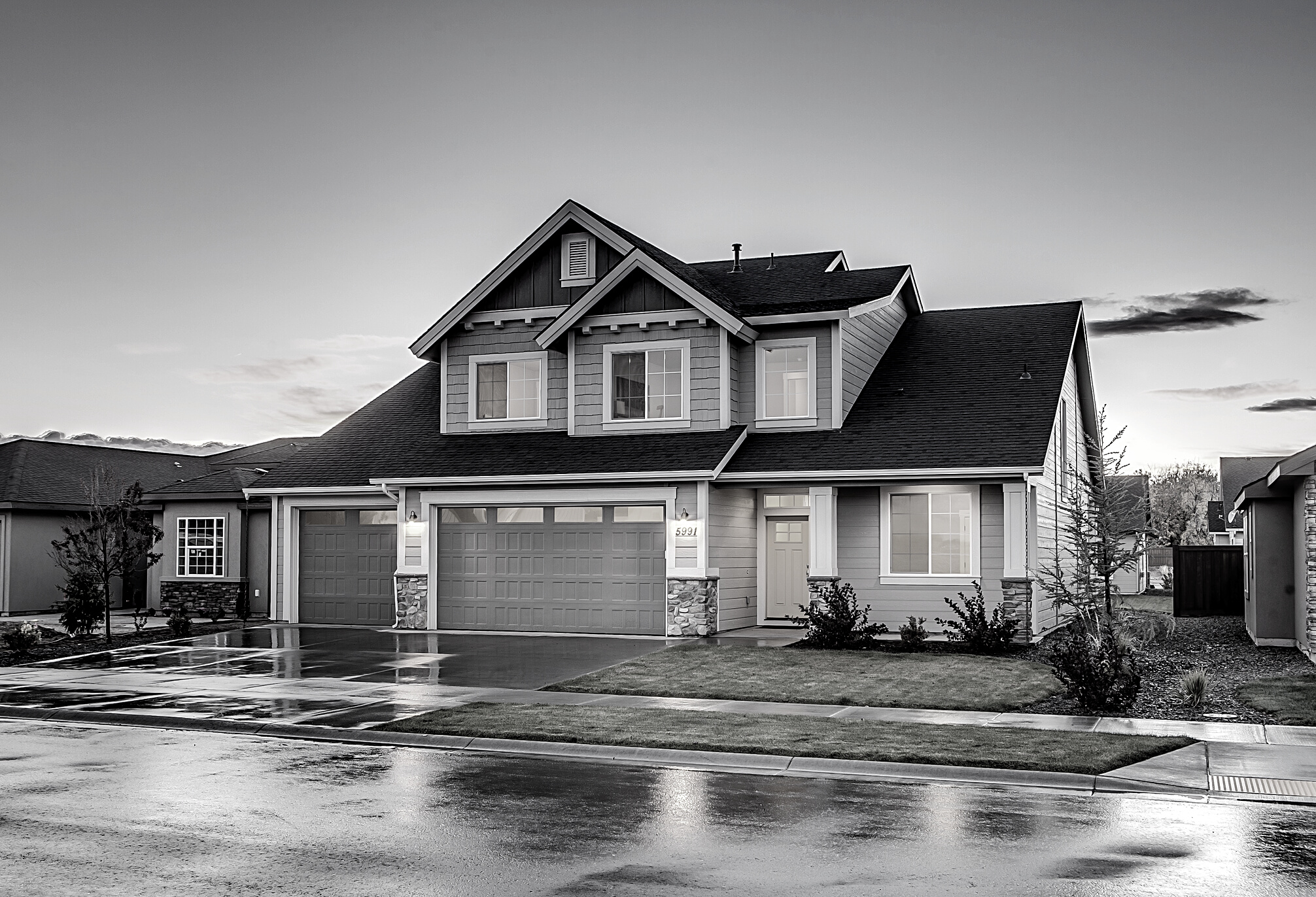Blue and Gray Concrete House With Attic during Twilight